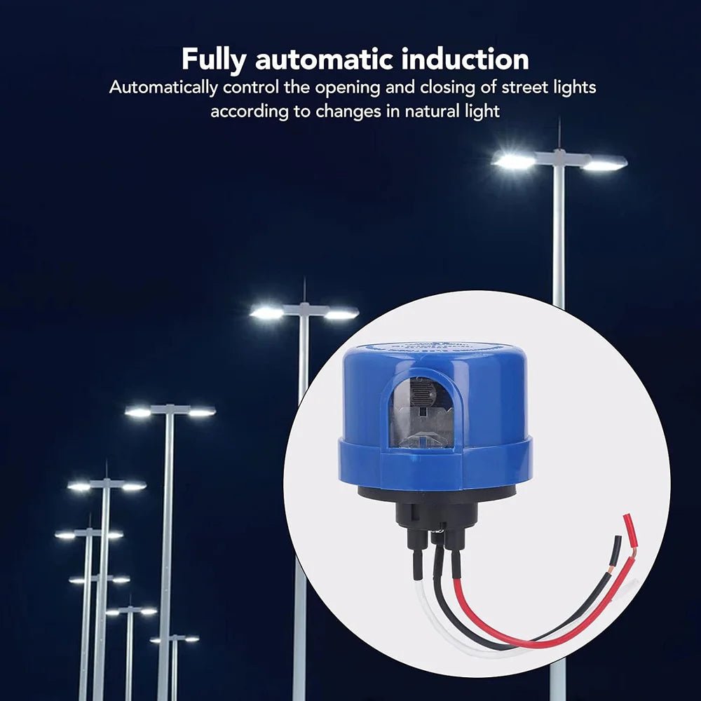Street light control unit with street lights in the background, highlighting fully automatic induction feature.