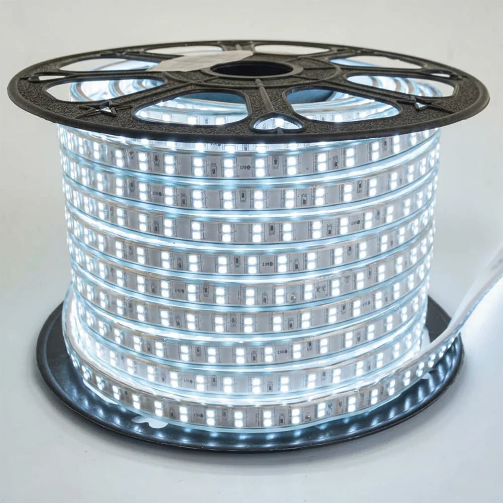 Spool of LED strip light on a white background