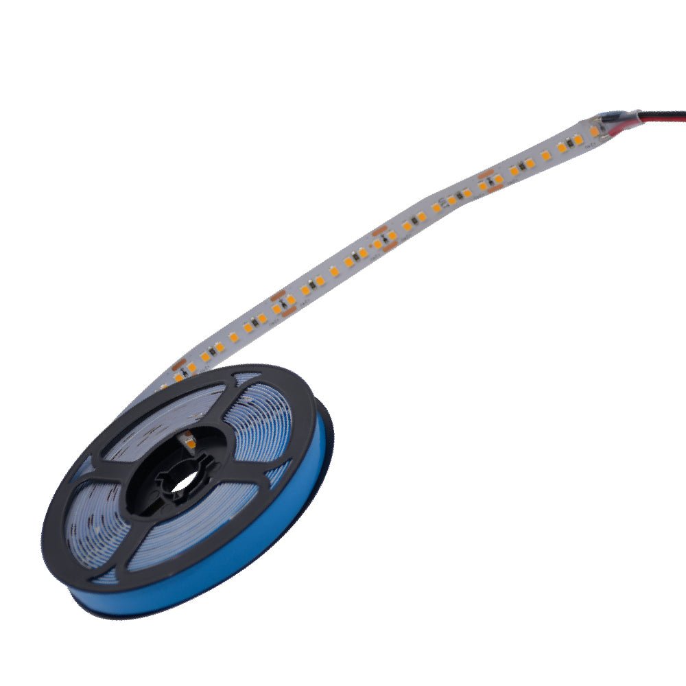 Spool of LED strip light on a white background