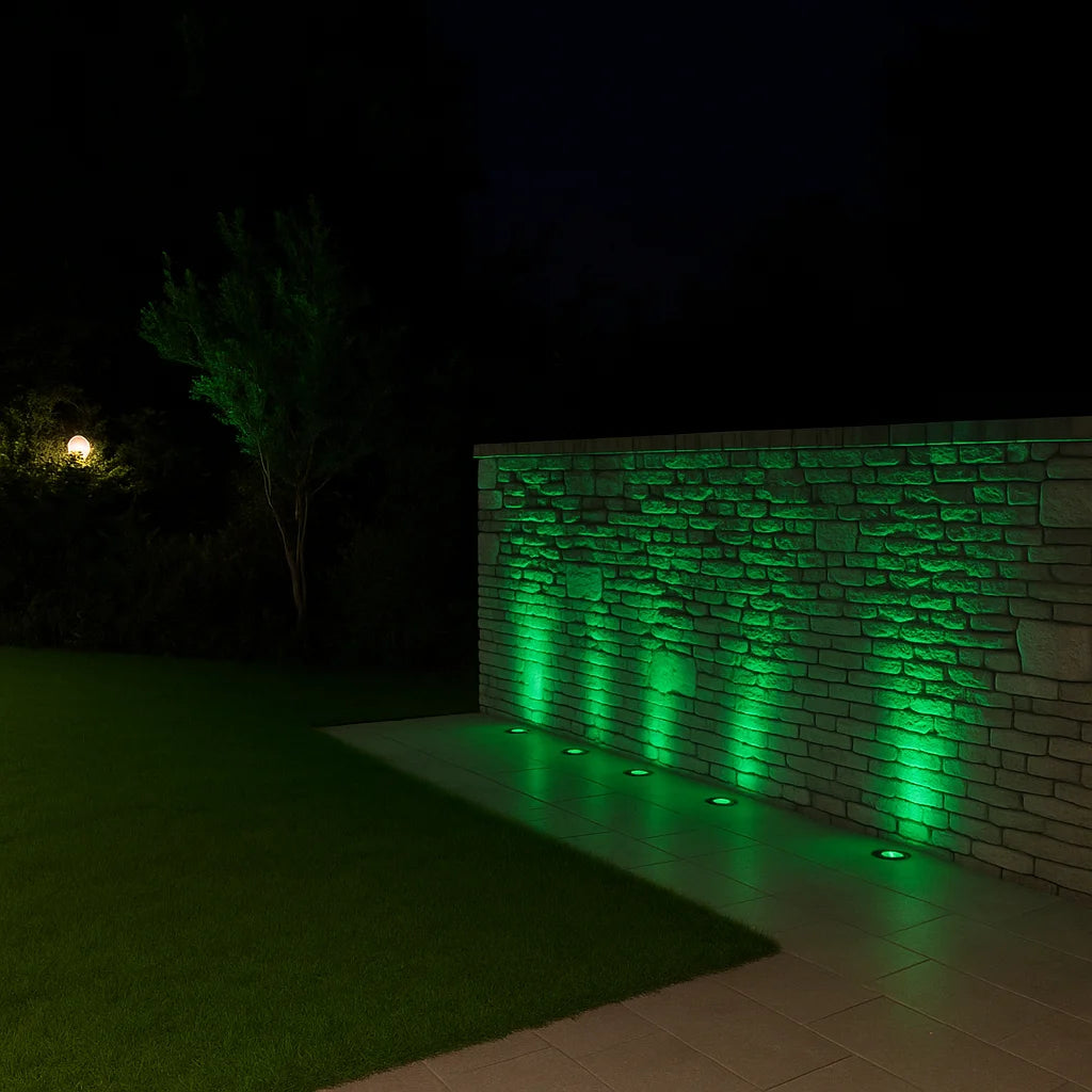 Green-lit stone wall at night with minimal background details