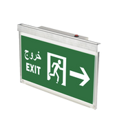 An emergency exit sign light with the word 'EXIT' in English and Arabic script, featuring a right-pointing arrow symbol, housed in a rectangular green casing with a polished steel finish.