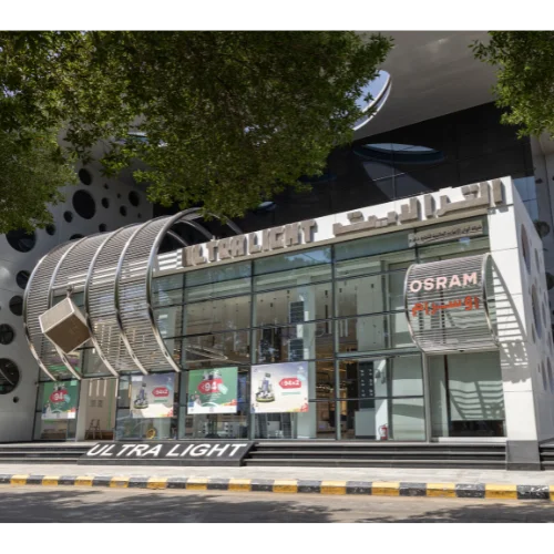 Modern building facade with glass windows and Osram branding