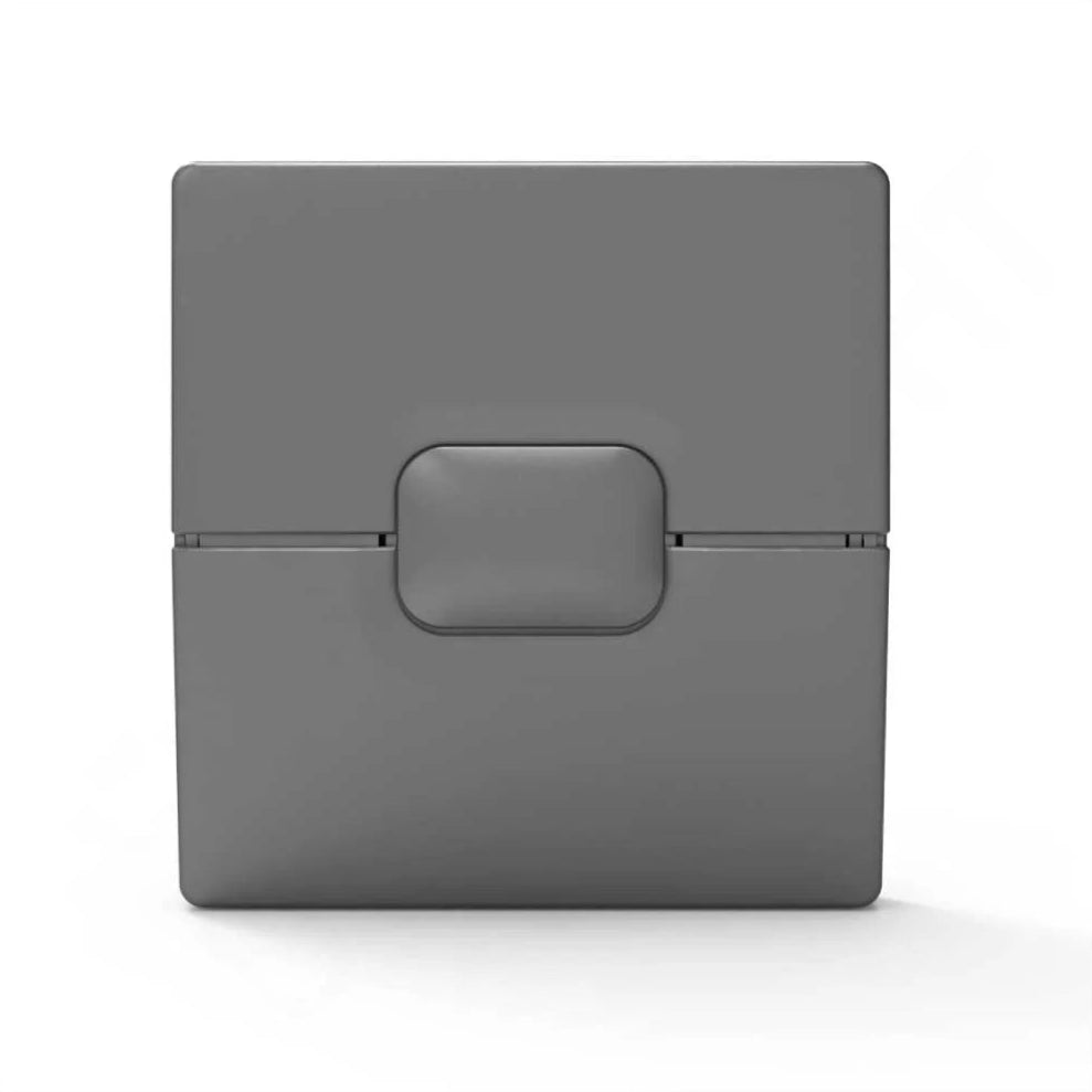 Gray rectangular object with a central button on a white background