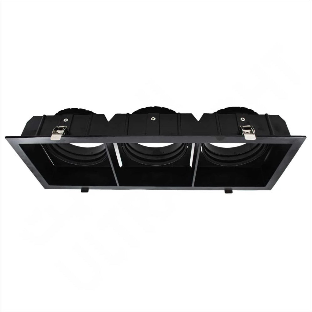 Black rectangular light fixture with multiple circular components on a white background