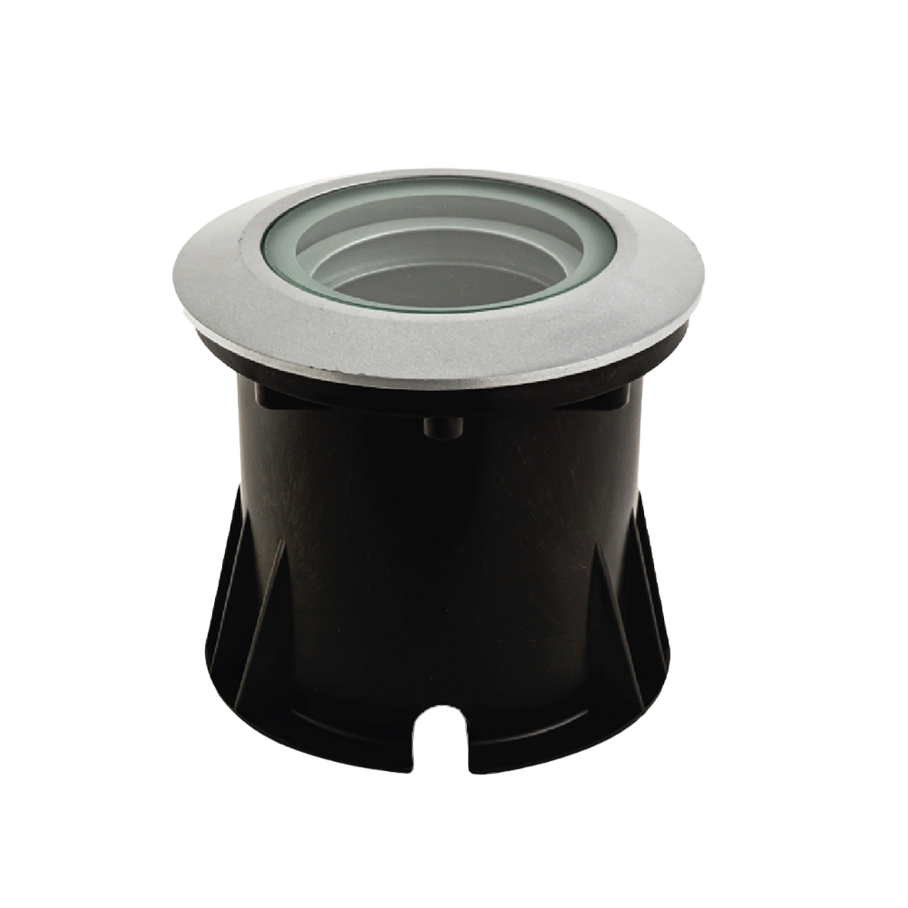 A silver recessed inground light with a transparent glass cover, made of corrosion-resistant aluminum, designed for outdoor lighting.