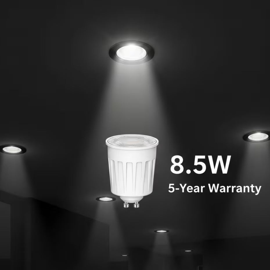 LED light bulb with 8.5W rating and 5-year warranty on a dark background