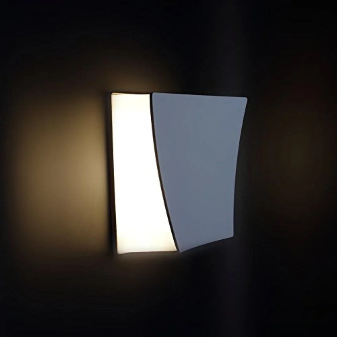 Modern wall light fixture on a dark background