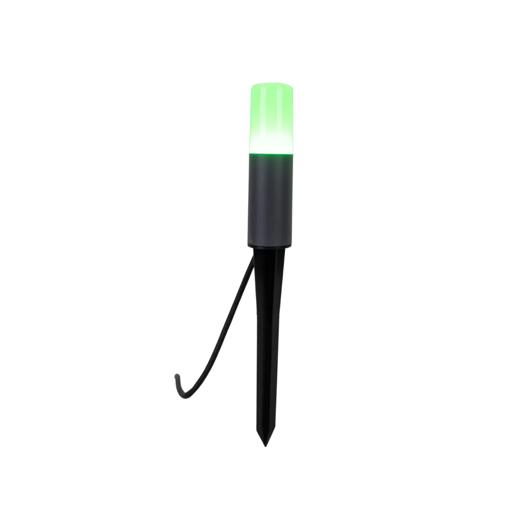 Green LED light with a black stake on a white background