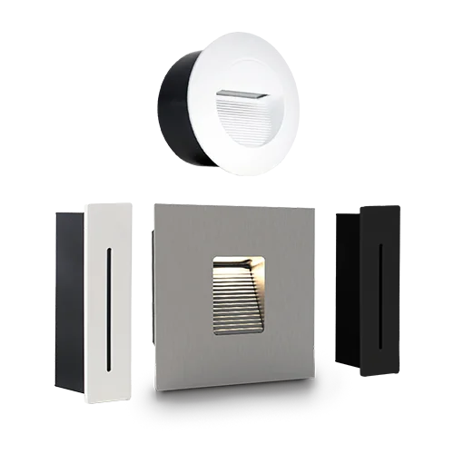 Modern wall-mounted light fixture with black, white, and silver components on a white background