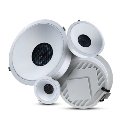 Set of white ceiling speakers on a white background