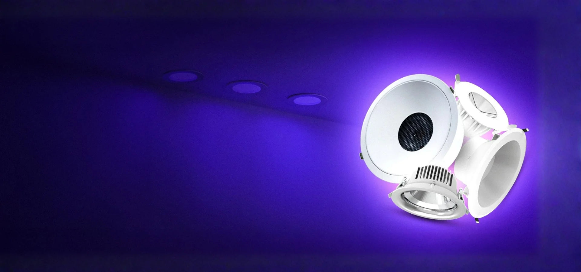 White spotlight on a dark background with purple lighting