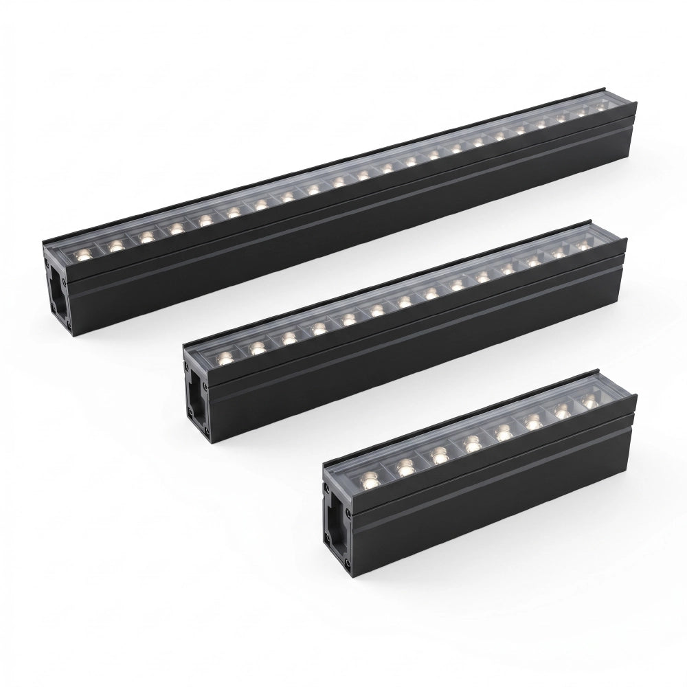 Three black LED light strips on a white background
