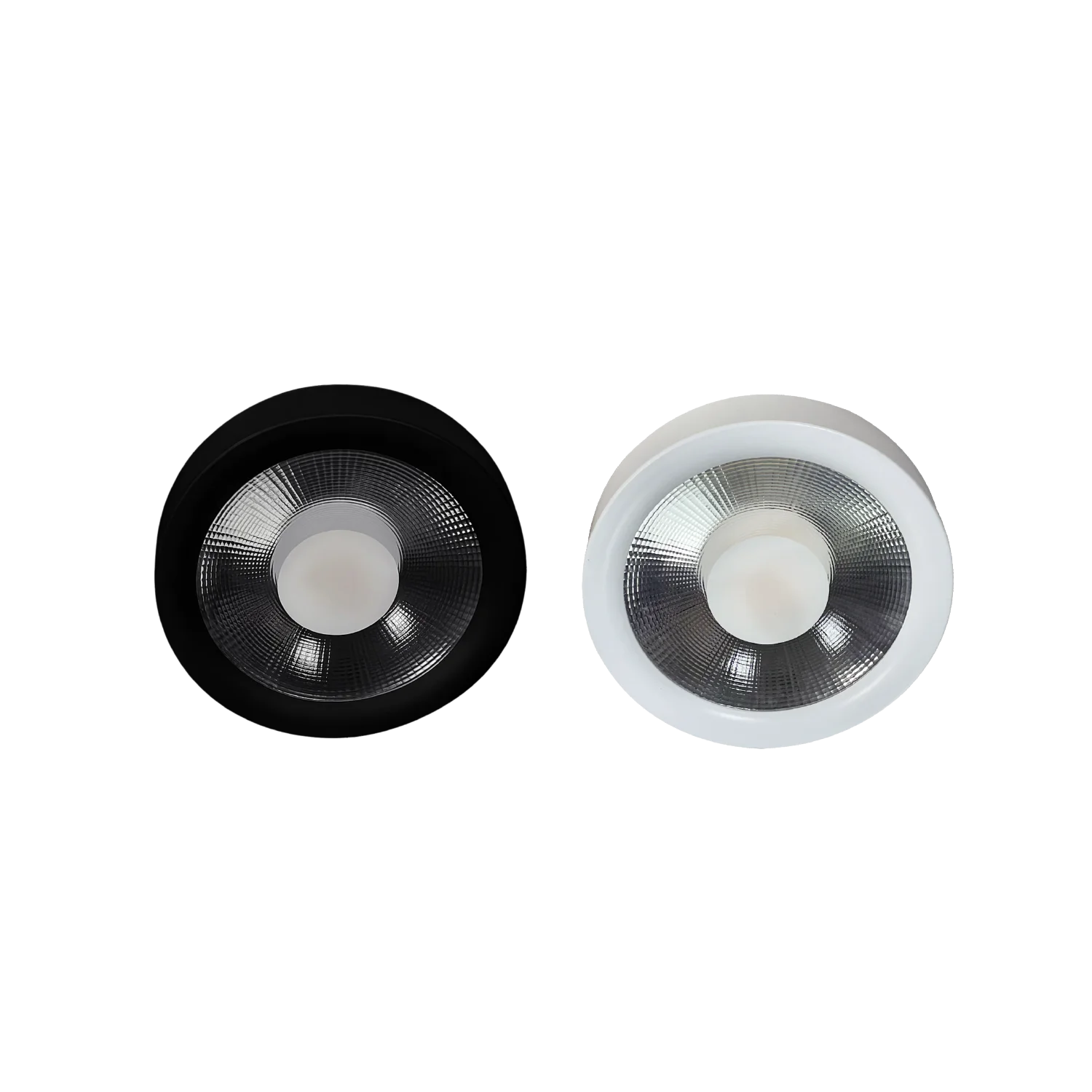 Two round light fixtures, one black and one white, on a white background