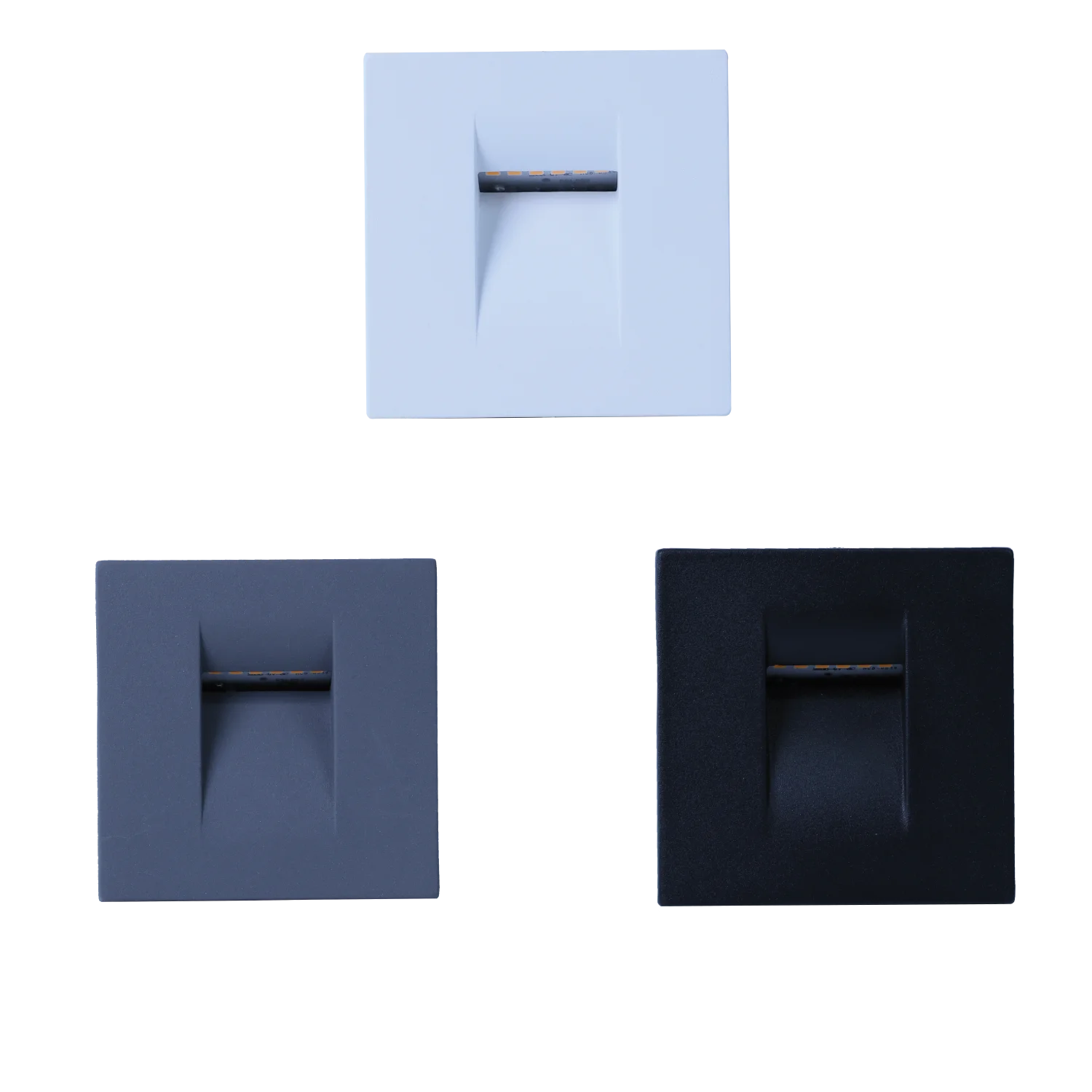Three wall-mounted LED stair lights in white, black, and gray colors, with a minimalist square design and a central LED module.