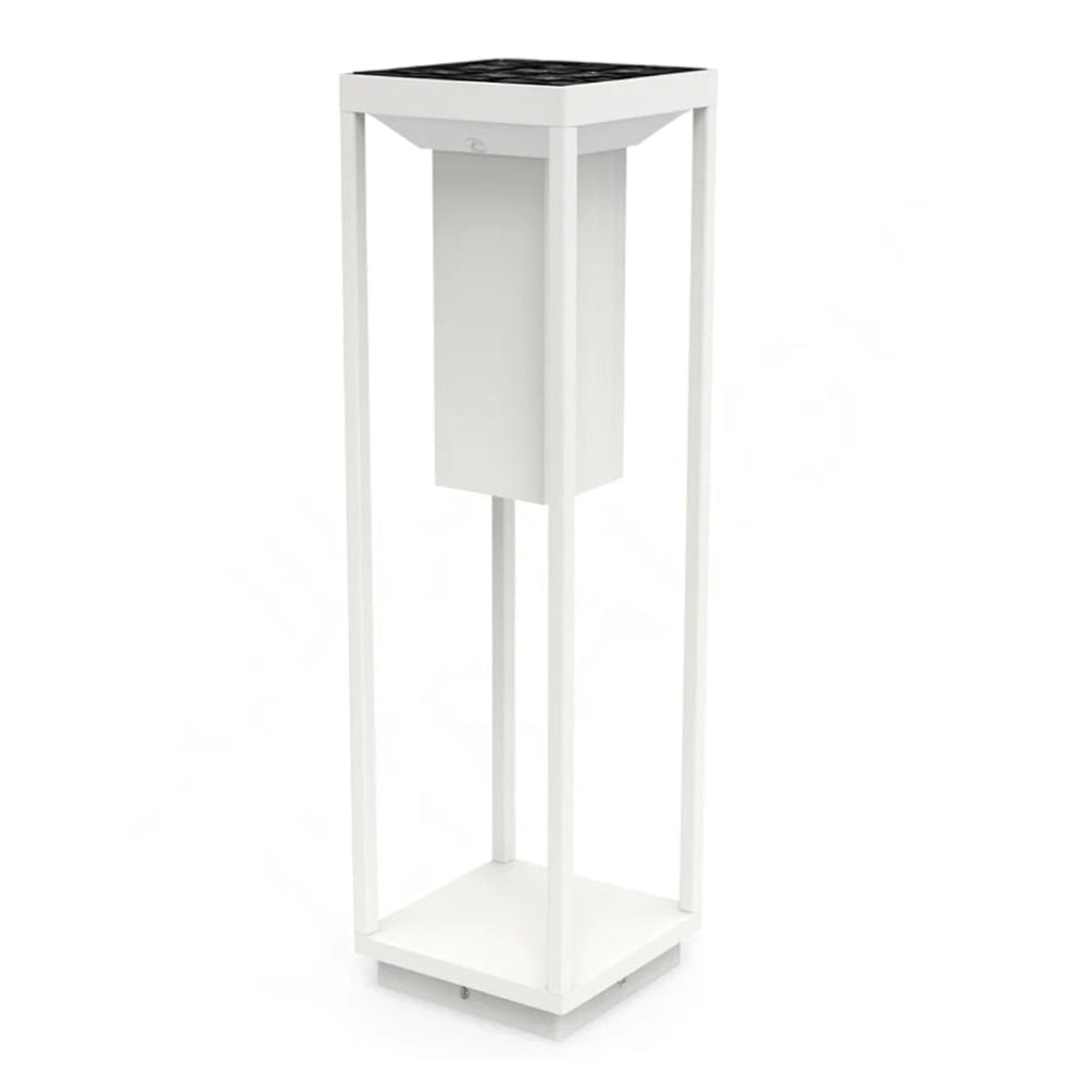 White plant stand with black top on a white background