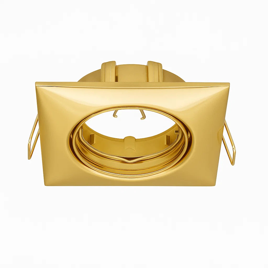 Gold recessed light fixture on a white background