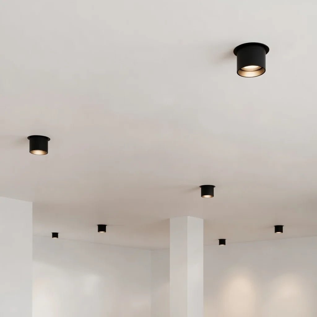 Modern black ceiling lights on a white ceiling
