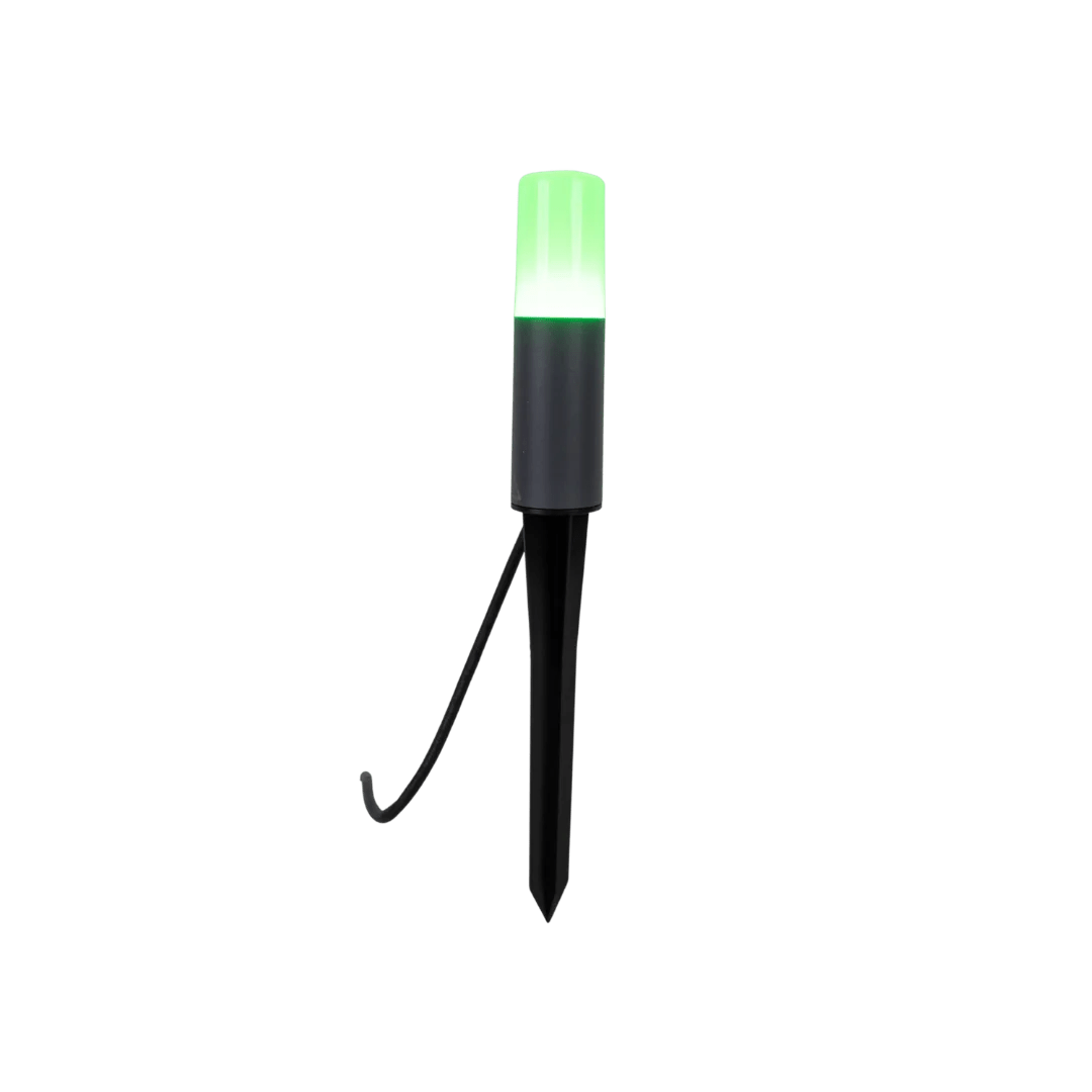 Green LED light with a black stake on a white background