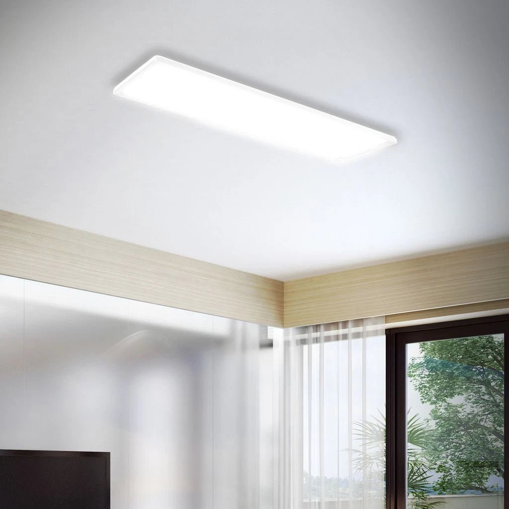 Ceiling light fixture in a modern room with a window