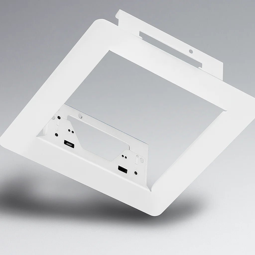 Ceiling-mounted air vent with multiple ports on a gray background