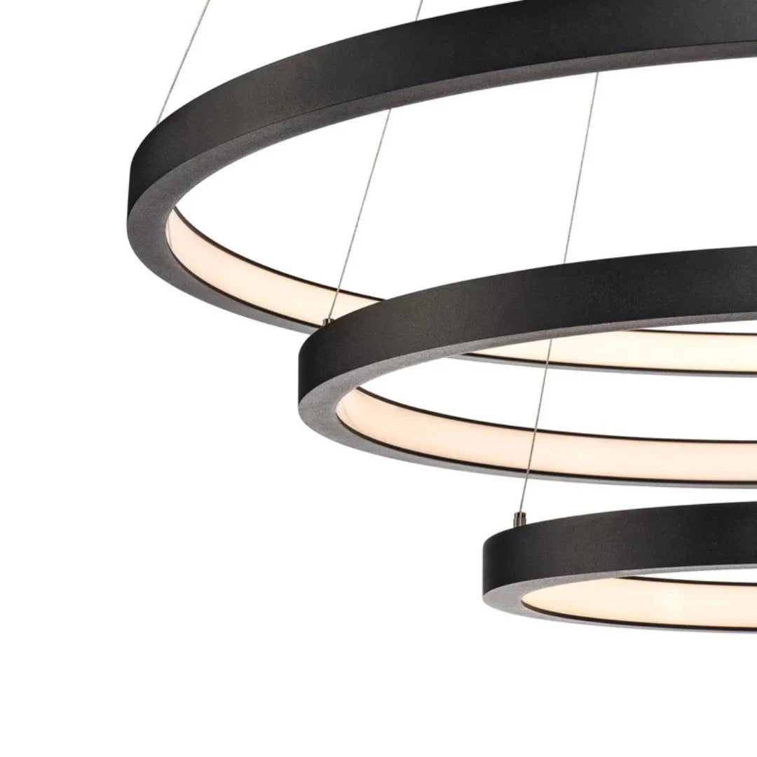 Modern black chandelier with circular design on a white background
