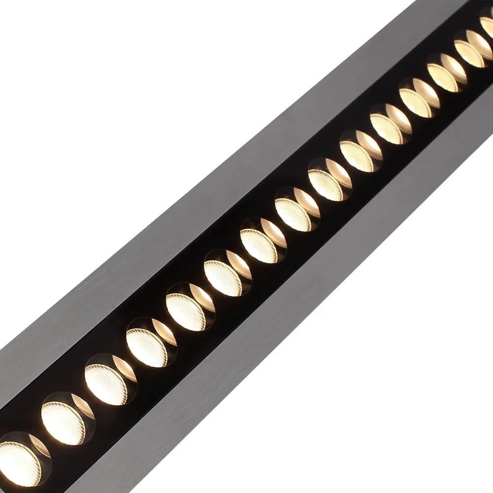Linear ceiling light fixture with multiple LED lights on a white background