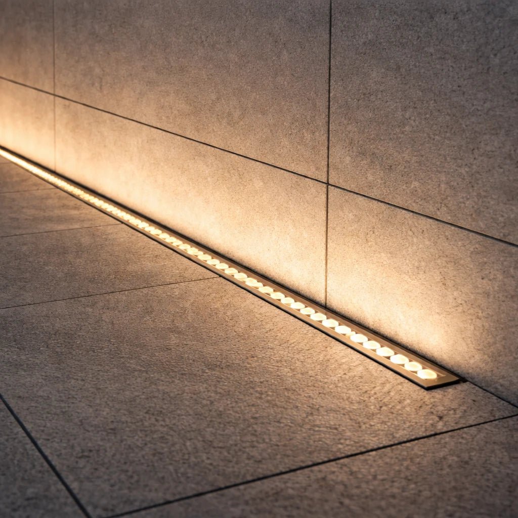 Linear LED strip light embedded in a concrete wall.