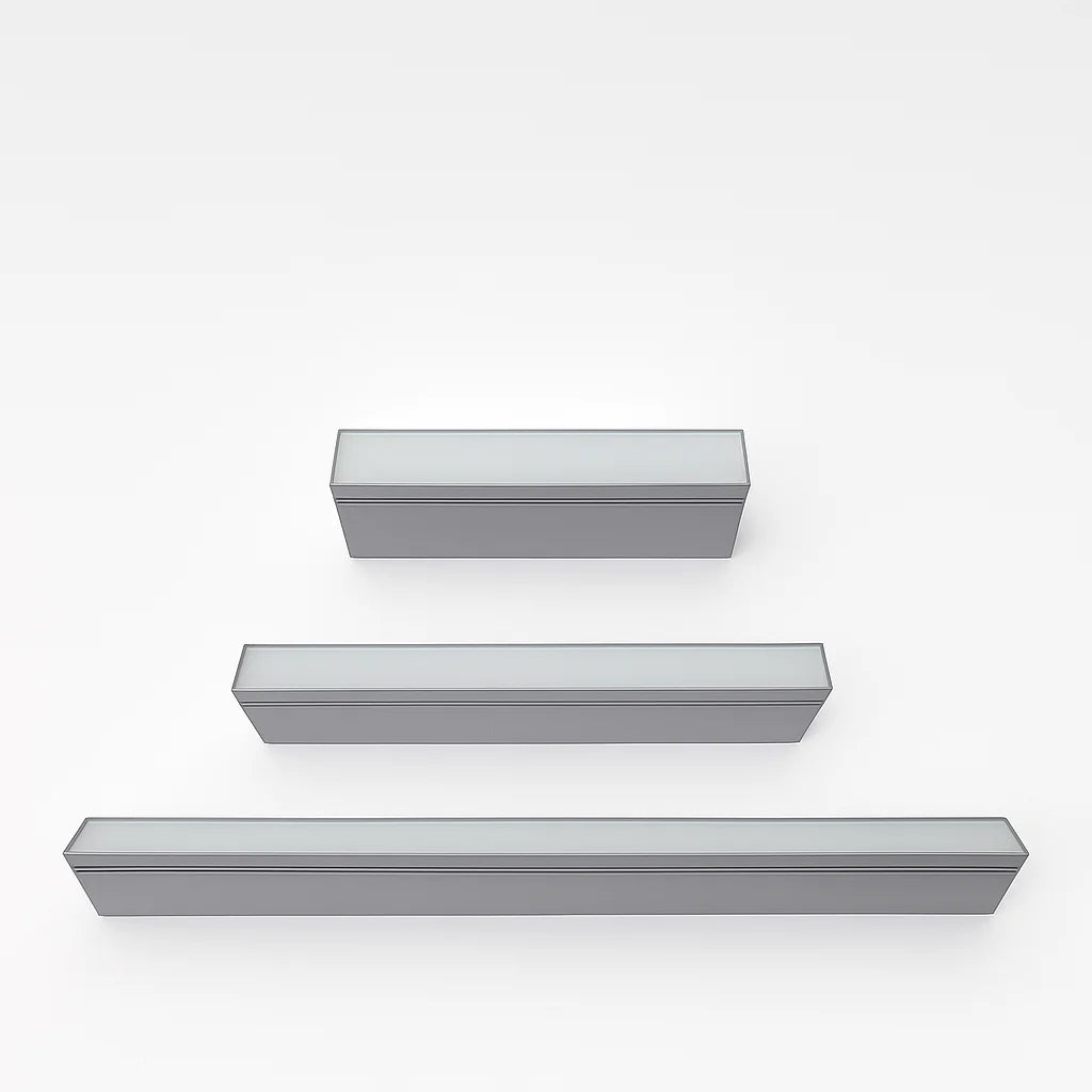 Set of three rectangular gray shelves on a white background