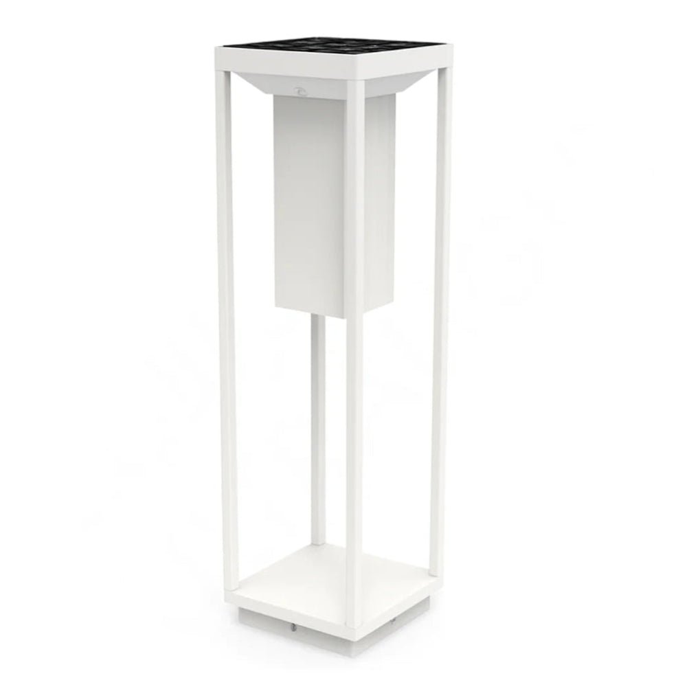 White plant stand with black top on a white background
