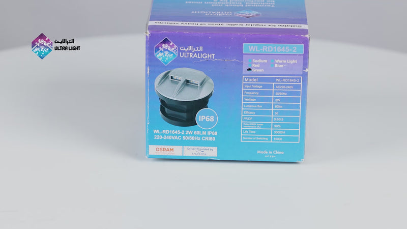 Outdoor light fixture with green LED lights on a white background