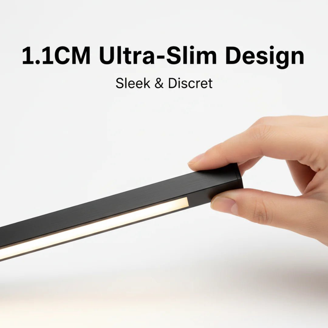 Hand holding a slim black strip with text '1.1CM Ultra-Slim Design' and 'Sleek & Discret' on a white background