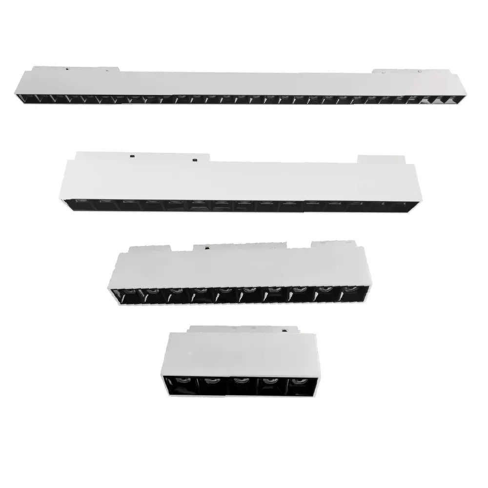 Set of four metallic connectors on a white background
