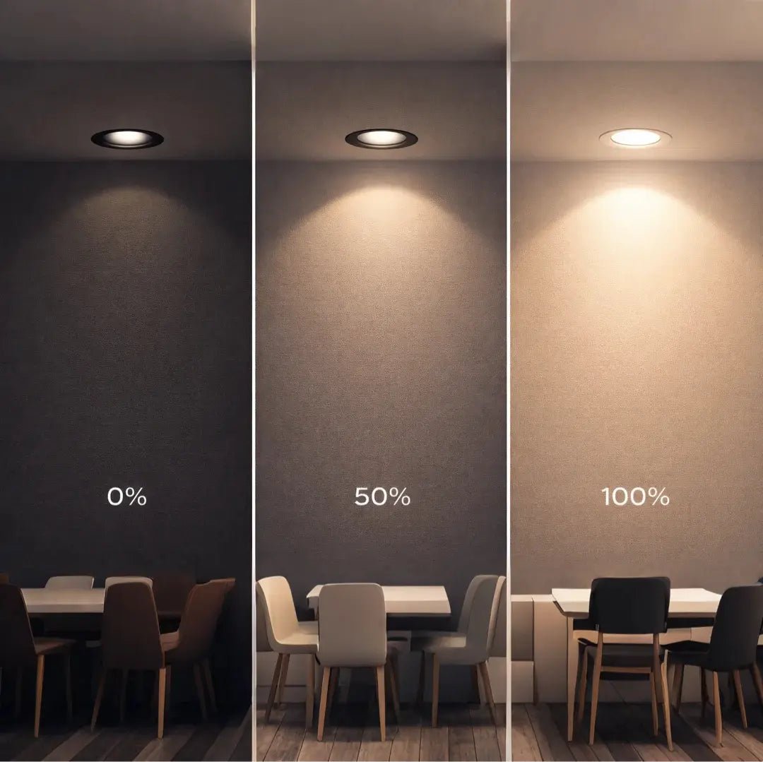 Three stages of a light fixture's brightness on a wall with chairs below.