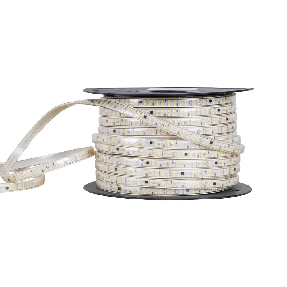 Spool of LED strip light on a white background