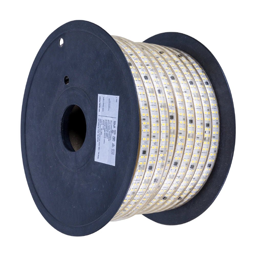 Spool of LED strip light on a white background