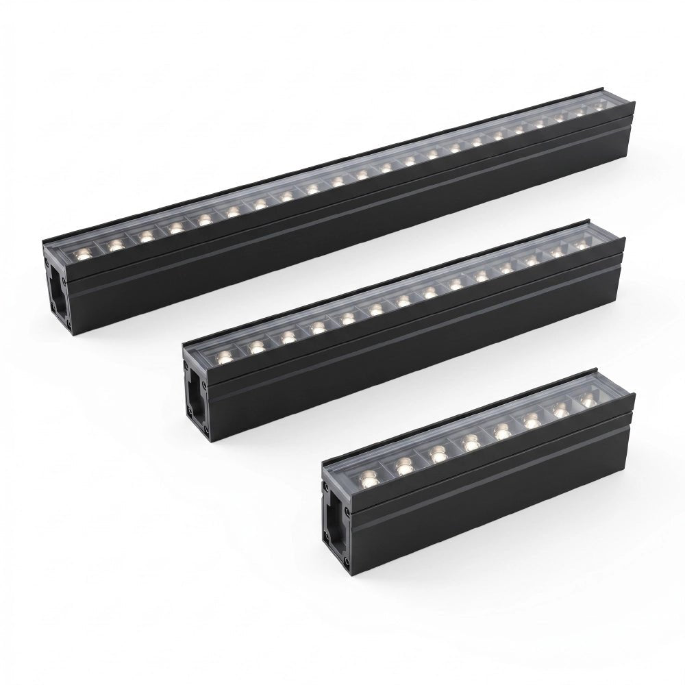 Three black LED light strips on a white background