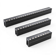 Three black LED light strips on a white background