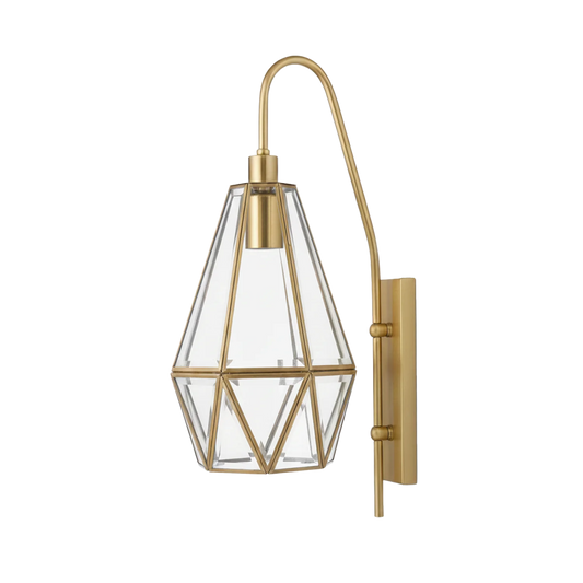 Gold wall-mounted light fixture with geometric glass shade on a white background