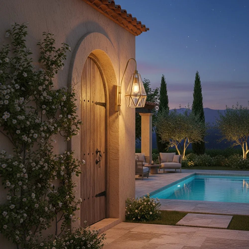 Evening view of a house exterior with a pool and garden.