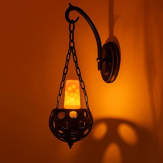 Decorative wall light with chain and lantern-style shade on an orange background
