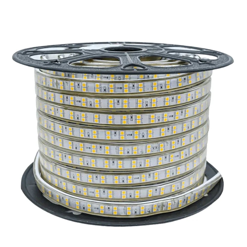 Spool of LED strip light on a white background
