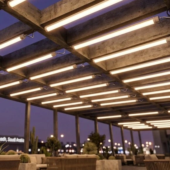 Wooden pergola with string lights at night, outdoor setting