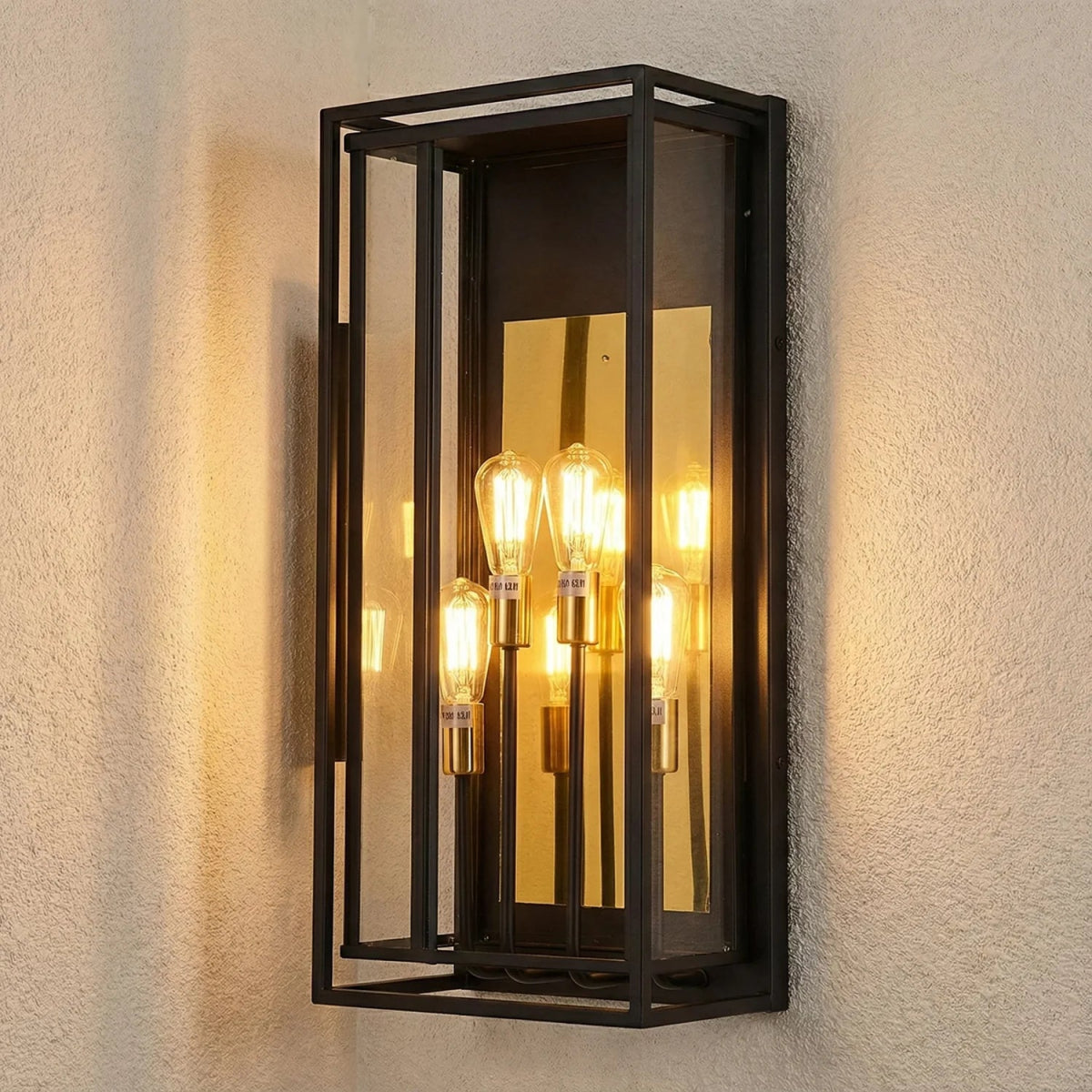Decorative wall light fixture with glass panels on a textured wall.