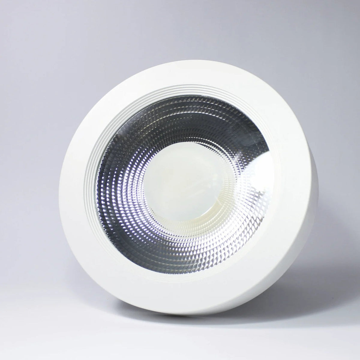 White LED downlight on a gray background