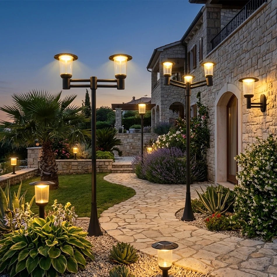 Evening view of a stone building with outdoor lighting fixtures.