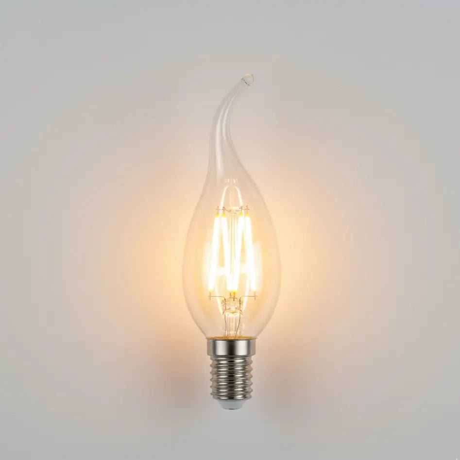 Vintage-style light bulb on a gradient gray background
