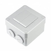 White plastic junction box with two sockets on a white background