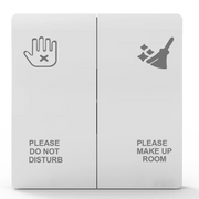 Two signs on a door with symbols and text indicating 'Please Do Not Disturb' and 'Please Make Up Room'.
