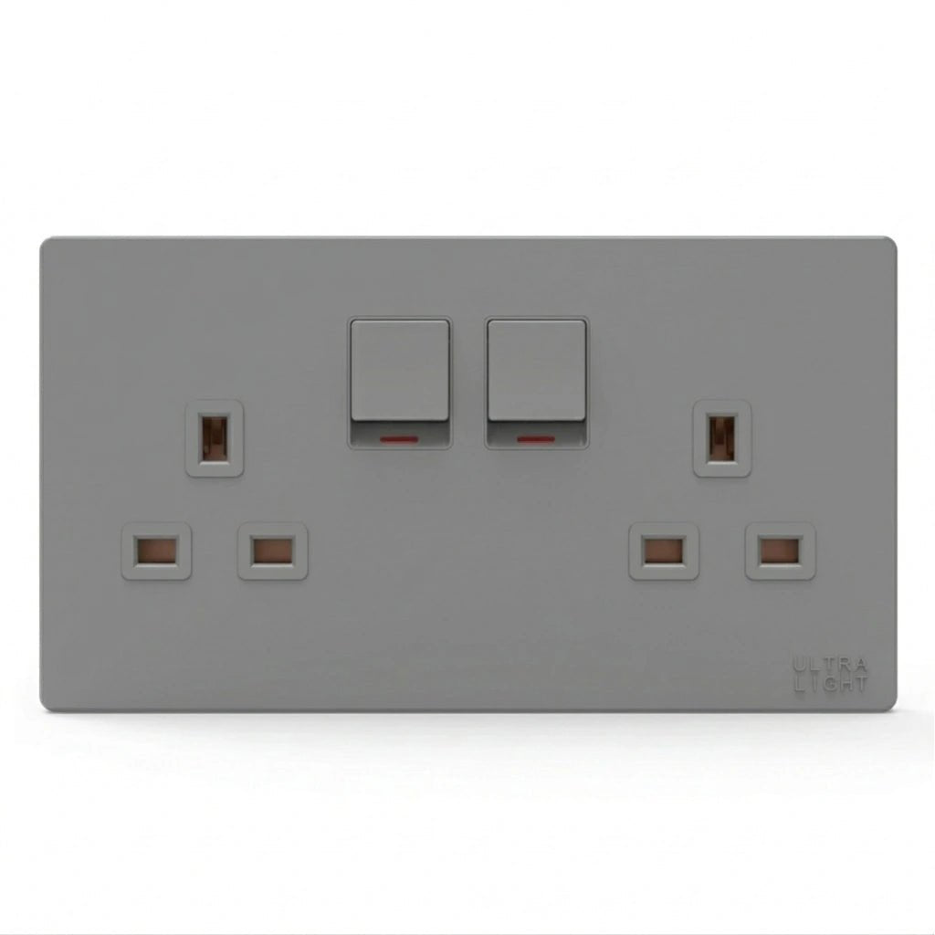 Gray electrical socket with two switches on a white background