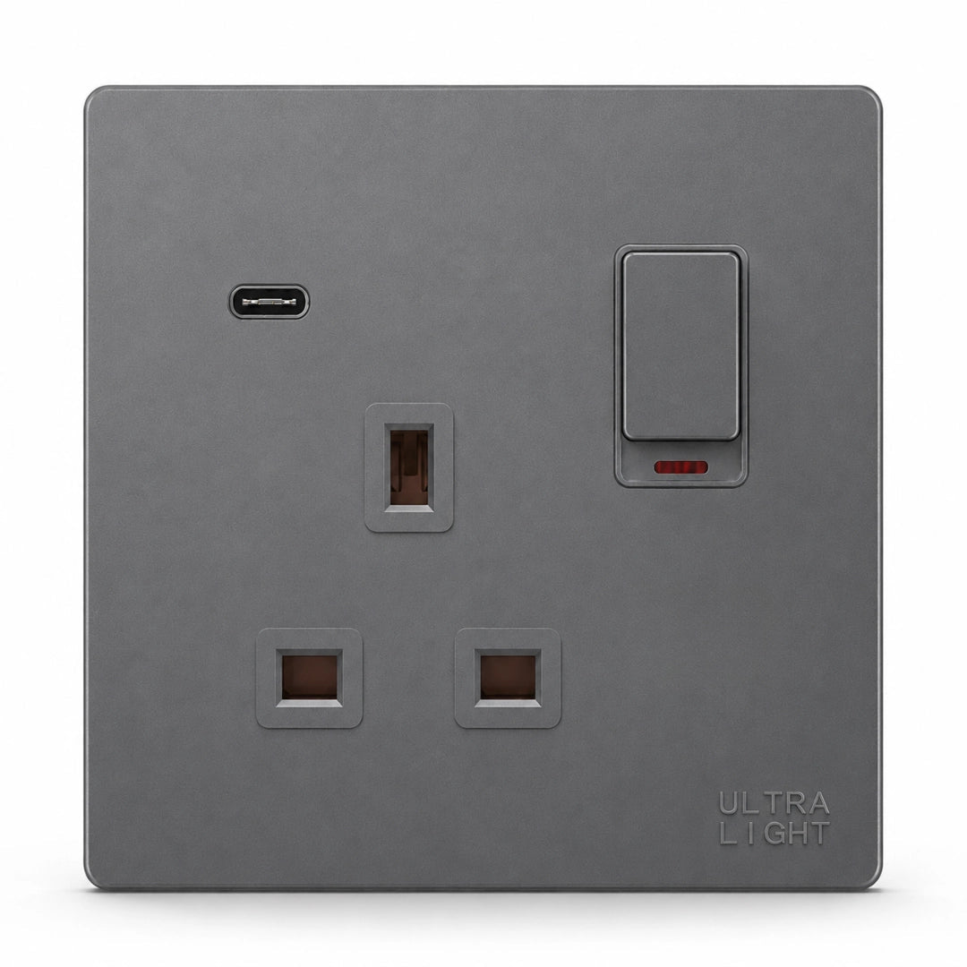 Gray wall switch with USB port and sockets on a white background